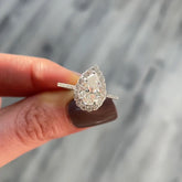 Exquisite Pear Cut Halo Engagement Rings