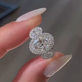 Three Stone Oval Cut Sterling Silver Halo Engagement Rings