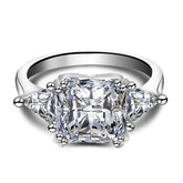 Three Stones Radiant Cut Sterling Silver Wedding Rings