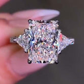 Three Stones Radiant Cut Sterling Silver Wedding Rings