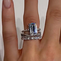 Cross Design Sterling Silver Emerald Cut Engagement Rings