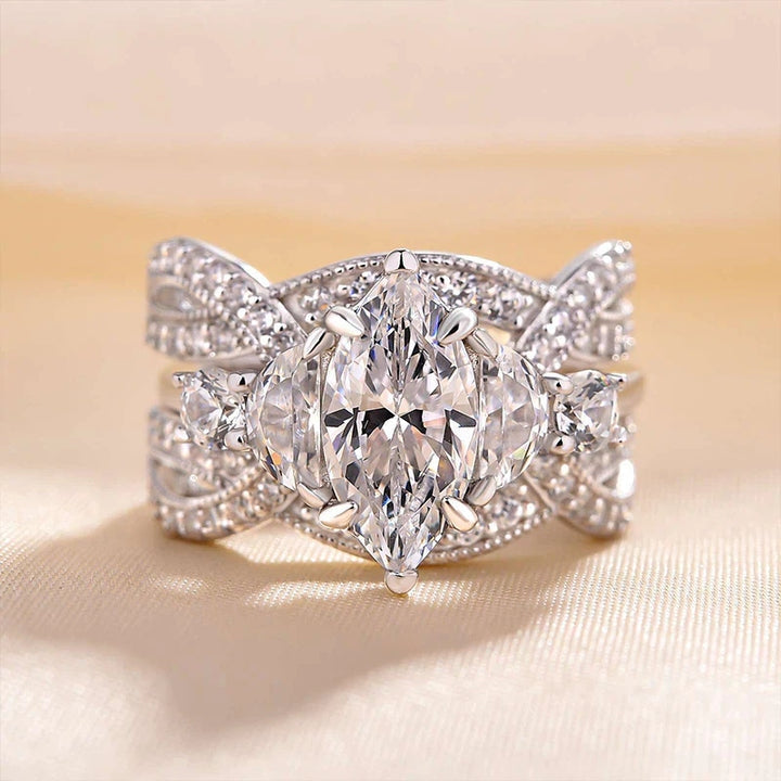 Interweaving Marquise Cut Sterling Silver Bridal Ring Sets