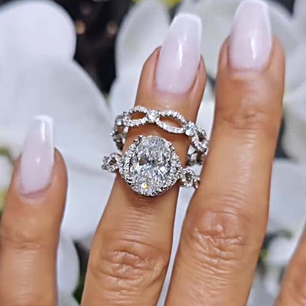 Interwoven Oval Cut Sterling Silver Wedding Sets