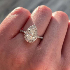 Exquisite Pear Cut Halo Engagement Rings