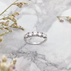 Chaste Round Cut Sterling Silver Wedding Bands