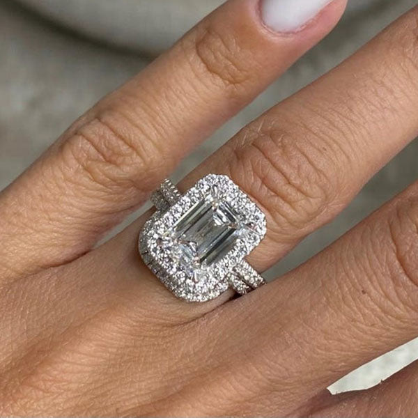 Curved Sterling Silver Emerald Cut Engagement Rings