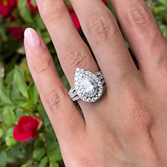 Three Arm Pear Cut Sterling Silver Halo Engagement Rings