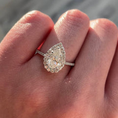 Exquisite Pear Cut Halo Engagement Rings