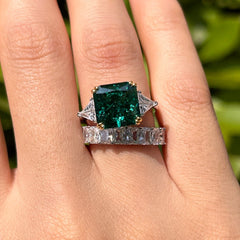 Emerald Radiant Cut Three Stone Sterling Silver Wedding Rings