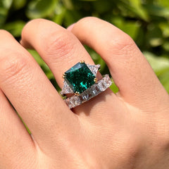 Emerald Radiant Cut Three Stone Sterling Silver Wedding Rings