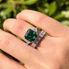 Emerald Radiant Cut Three Stone Sterling Silver Wedding Rings