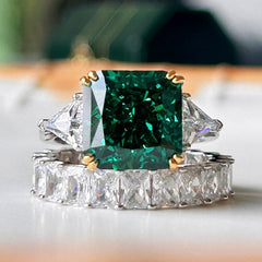 Emerald Radiant Cut Three Stone Sterling Silver Wedding Rings