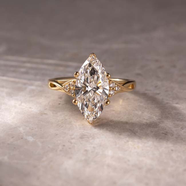 Simplicity Marquise Cut Yellow Gold Vintage Engagement Rings