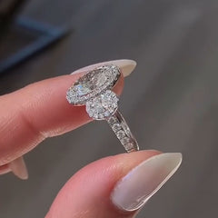 Three Stone Oval Cut Sterling Silver Halo Engagement Rings