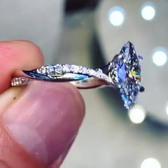 Interweaving Marquise Cut Sterling Silver Wedding Rings