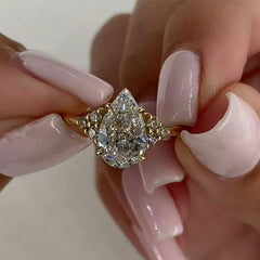 Simplicity Pear Cut Sterling Silver Vintage Engagement Rings